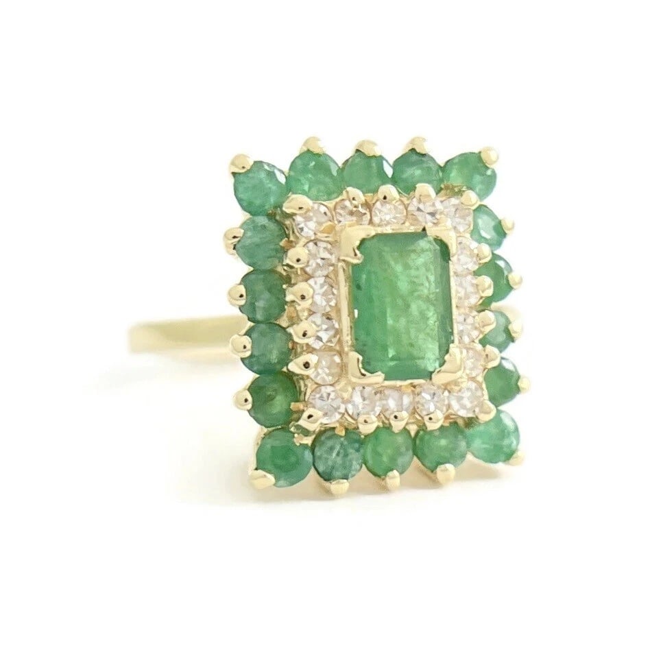 Vintage Green Emerald Diamond Halo Cocktail Ring 14K Yellow Gold, 4.81 Grams: Vintage Green Emerald Diamond Halo Cocktail Ring 14K Yellow Gold, 4.81 Grams This is a gorgeous statement ring! Let us know if you have any questions. Gemstones: 1.04 ctw; 1 emerald cut green