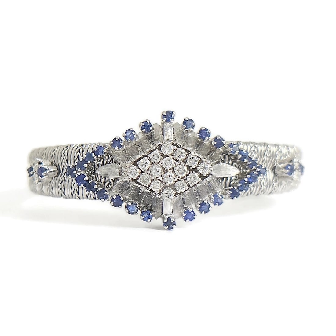 Vintage Blue Sapphire Diamond Geometric Cluster Bracelet 18K White Gold, 32.3 Gr: Vintage Blue Sapphire Diamond Geometric Cluster Bracelet 18K White Gold, 32.3 Grams This beautiful one-of-a-kind vintage bracelet will add style to any outfit. Please let us know if you have any
