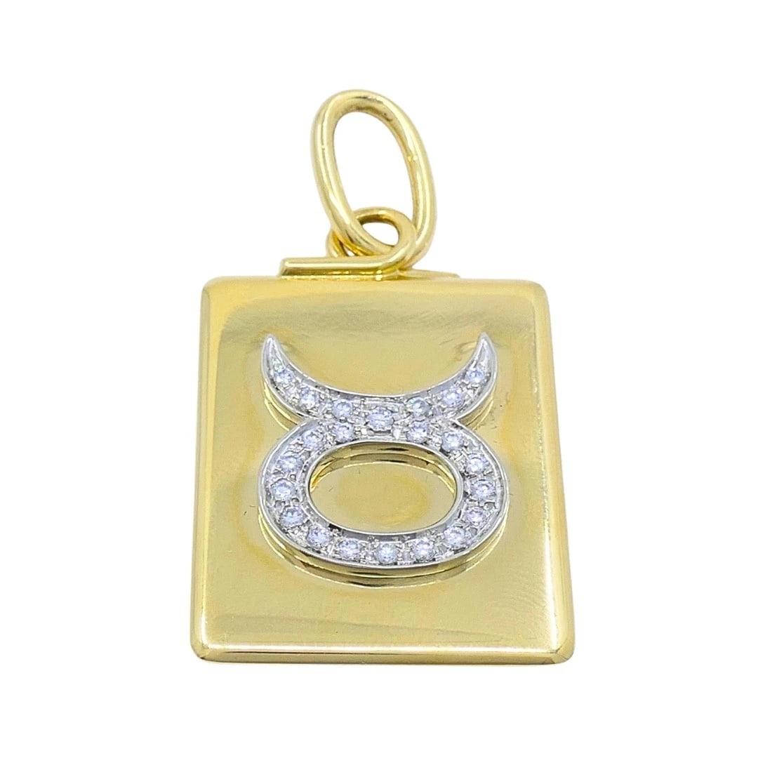 Pomellato 18k Gold Diamond Taurus Zodiac Pendant: DESIGNER: Pomellato CIRCA: Late 20th Century MATERIALS: 18K Gold GEMSTONE: Diamond WEIGHT: 30.8 Grams MEASUREMENTS: 1" x 1 5/16" HALLMARKS: PomellatoITEM DETAILS:Pomellato 18k Gold Diamond Taurus Zodi