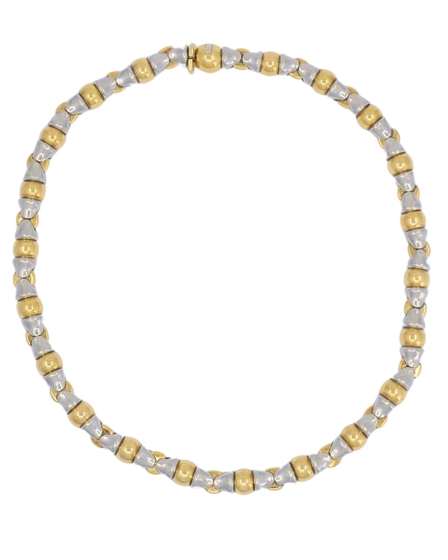 Bvlgari Vintage Bulgari 18k Gold Stainless Steel Collar Necklace: NS JUUUT A vintage Bulgari collar necklace made of 18k gold and stainless steel. The necklace features a repeating link design that alternates polished gold elements with stainless steel sections. Thi