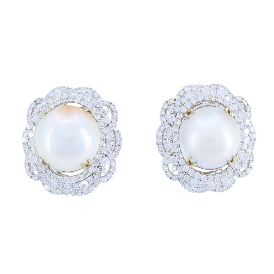 HANA 18K White Gold Mabe Pearl Diamond Drop Earrings, 2.36 Carats: KL NTOO These 18 karat white gold diamond and mabe pearl earrings present a dimensional, sculptural design centered around luminous domed mabe pearls framed by a tiered halo of round brilliant cut