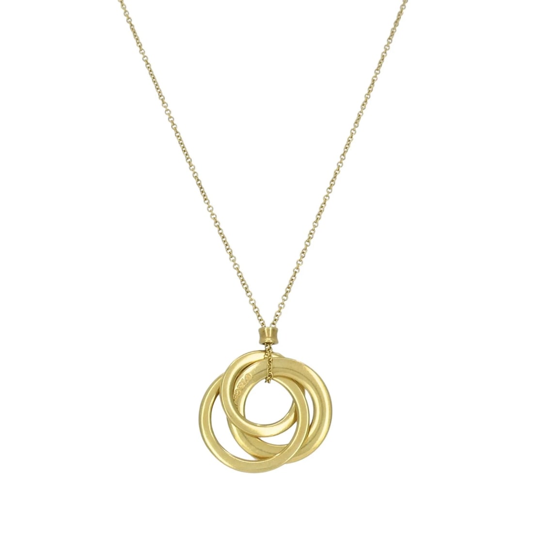 Tiffany & Co. 1837 Triple Interlocking Circles Pendant 18K Yellow Gold: KL JUOO Tiffany & Co. 18k yellow gold triple interlocking circles necklace featuring three graduated circular rings suspended in a layered, intertwined arrangement. The design reflects Tiffany's late