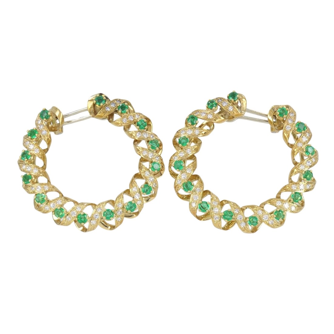 Vintage Asprey & Co. 18k Gold Diamond Emerald Circular Earrings: KL JUOOO These Asprey emerald and diamond hoop earrings are crafted in 18k yellow gold and feature a sculptural twisted ribbon design forming a bold, dimensional circular silhouette. The composition a