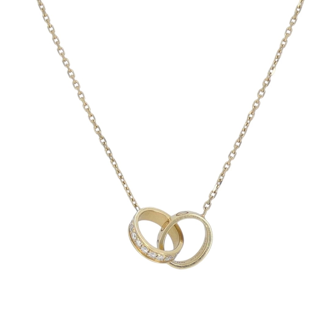 Cartier LOVE Interlocking 18k Gold Diamond Pendant Necklace: KL NOOO This Cartier Love interlocking rings necklace is crafted in 18k yellow gold and features the iconic double ring motif from the house's celebrated Love collection. The design centers on two