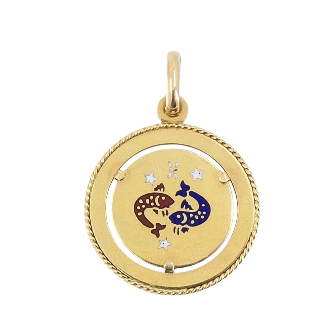 Vintage UnoAErre 18k Gold Enamel Pisces Zodiac Pendant Charm: Designer: UnoAErre Materials: 18k Gold, Enamel Weight: 4.4 Grams Measurement: Diameter - 7/8" Hallmarks: UnoAErre, 750, 1 ARITEM DETAILS:Vintage UnoAErre 18k Gold Enamel Pisces Zodiac Pendant CharmVin