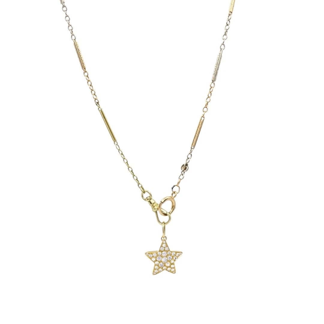 14k Gold Diamond PavÃ© Star Pendant on Antique Barâ€‘Link Chain: CIRCA: 2000s & 0s MATERIALS: 14k Gold GEMSTONE: Diamond WEIGHT: Pendant - 1.8 Grams; Chain - 8.9 Grams MEASUREMENTS: Pendant - 5/8" Chain - 15 1/2"ITEM DETAILS:14k Gold Diamond PavÃ© Star Pe