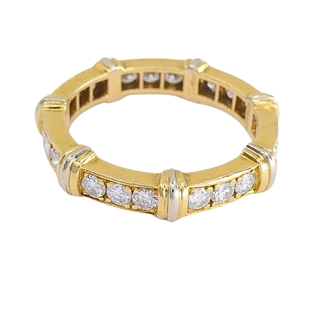 Cartier 18k Gold Contessa Diamond Eternity Band Ring: DESIGNER: Cartier CIRCA: 1990s MATERIALS: 18k Gold GEMSTONE: Diamonds WEIGHT: 4.3 Grams MEASUREMENTS: 1/8â€ RING SIZE: 5.75 - 6 (52) - not resizable HALLMARKS: Cartier, 750, 52, seria