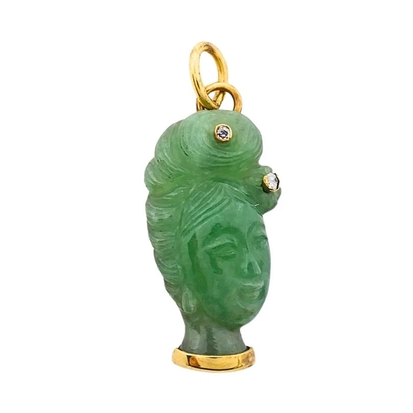 Vintage 14k Gold Carved Jade Lady's Head Charm Pendant Diamond Accents: MATERIALS: 14k Gold WEIGHT: 3 Grams MEASUREMENTS: 3/8" x 7/8"ITEM DETAILS:Vintage 14k Gold Carved Jade Lady's Head Charm Pendant Diamond AccentsElegant vintage 14k gold charm pendant featuring a finel