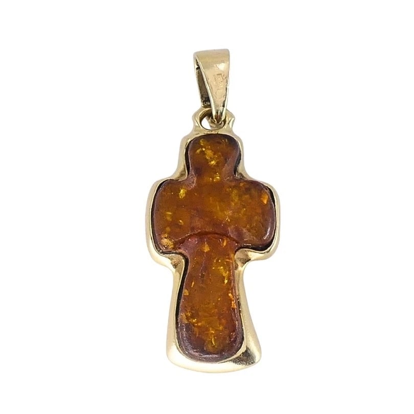 Vintage 14k Gold Baltic Amber Cross Pendant: CIRCA: Late 20th Century MATERIALS: 14K Gold WEIGHT: 3.7 Grams MEASUREMENTS: 9/16" x 1 1/8"ITEM DETAILS:Vintage 14k Gold Baltic Amber Cross Pendant This vintage 14k gold cross pendant features a solid