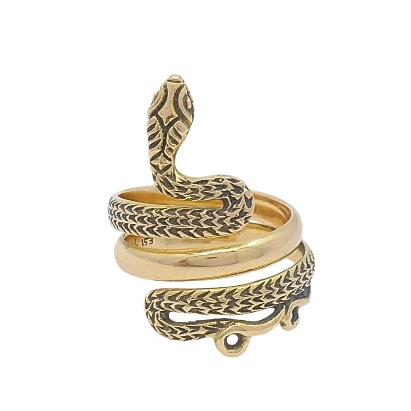 Vintage 18k Gold Snake Ring Serpent Design: MATERIALS: 18k Gold WEIGHT: 9.1 Grams RING SIZE: 7.25 - 7.5 HALLMARKS: E51, 750ITEM DETAILS:Vintage 18k Gold Snake Ring Serpent Design This 18k gold snake ring features a detailed serpent motif, blend