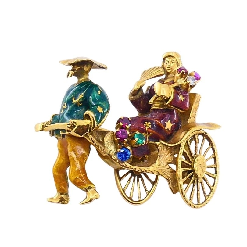 Vintage 18k Gold Enamel Riksha Brooch Pin Gemstone Accents: MATERIALS: 18k Gold, Enamel WEIGHT: 12.5 Grams MEASUREMENTS: 1 1/8" x 1 1/4" HALLMARKS: 750ITEM DETAILS:Vintage 18k Gold Enamel Riksha Brooch Pin Gemstone AccentsExceptional vintage brooch crafted in