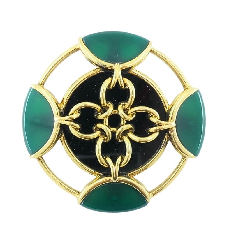 Vintage Tiffany & Co. Brooch Chrysoprase 18k Gold Onyx: DESIGNER: Tiffany & Co. CIRCA: 1980's MATERIALS: 18k Gold GEMSTONE: Onyx, ChrysopraseWEIGHT: 42.1 GramsMEASUREMENTS: Diameter - 2"HALLMARKS: Tiffany & Co. , 18KITEM DETAILS:Vintage Tiffany & Co. Brooc