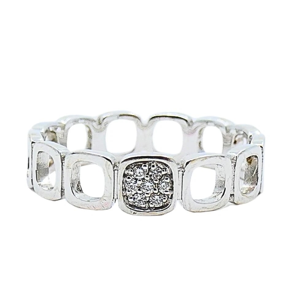 Dinh Van 18k White Gold Ring Diamond Band: DESIGNER: Jean Dinh Van CIRCA: 1970s MATERIALS: 18k GoldGEMSTONE: DiamondWEIGHT: 2.3 GramsMEASUREMENTS: 3/16" Width RING SIZE: 6-6.25 HALLMARKS: Dinh Van, 750ITEM DETAILS:Dinh Van 18k White Gold Ring 