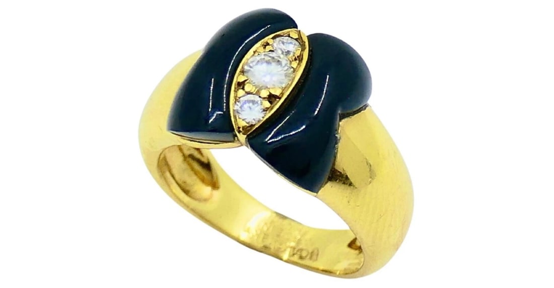 Van Cleef & Arpels Onyx Ring Diamond Papillon Ring: DESIGNER: Van Cleef & Arpels CIRCA: Late 20th Century MATERIALS: 18k Yellow GoldGEMSTONE: Onyx, Round Brilliant Cut DiamondWEIGHT: 7.1 gramsRING SIZE: 5HALLMARKS: VCA, 18K, Made in France, NYITEM
