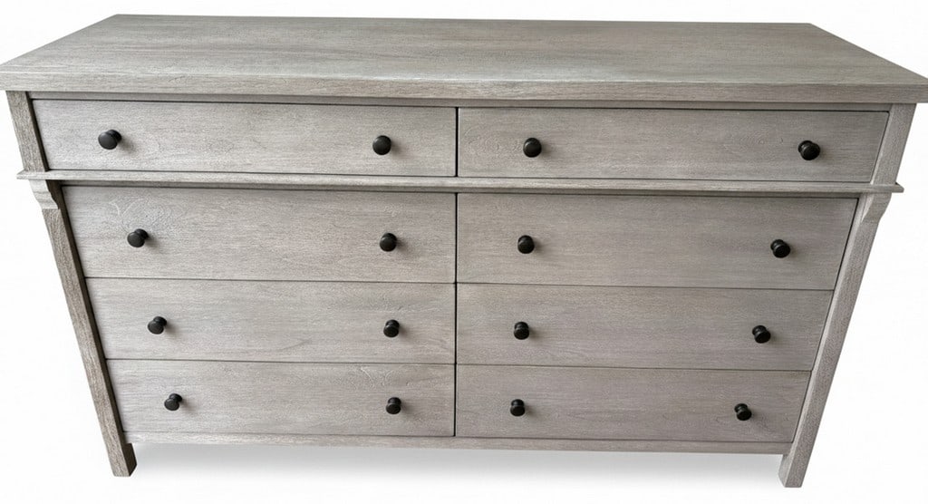 Contemporary Grey Washed Wooden Six-Drawer Dresser: A contemporary dresser featuring a grey washed wood finish and six drawers with black knob pulls. The top two drawers are smaller, with four larger drawers below, offering ample storage. The side