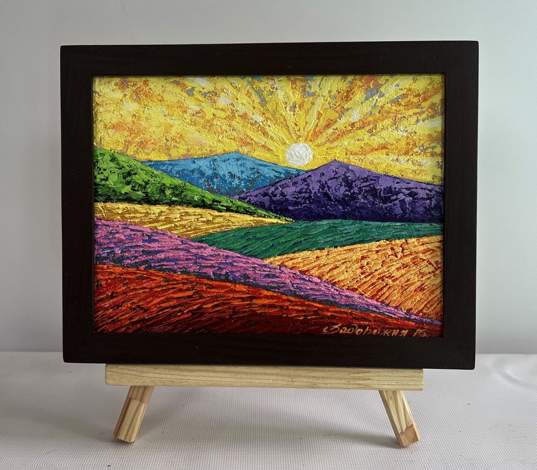Oil painting Horizon in the lights of the evening sun V. Zadorozhnya: AAA4656 The oil painting on cardboard titled "Horizon in The Lights of The Evening Sun" captures a mesmerizing landscape where The sun ba Thes The rolling hills and mountains in a golden glow. The