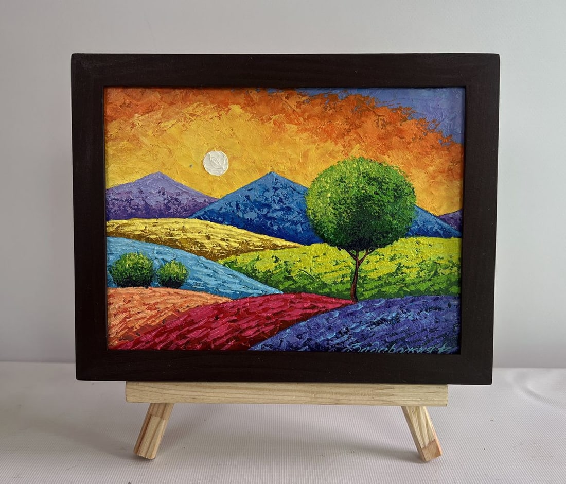 Oil painting Summer sunset over flowering slopes V. Zadorozhnya: AAA4657 The oil painting on cardboard titled "Summer Sunset Over Flowering Slopes" captures The serene yet vibrant atmosphere of a warm evening as The sun begins to set over rolling hills. The composi