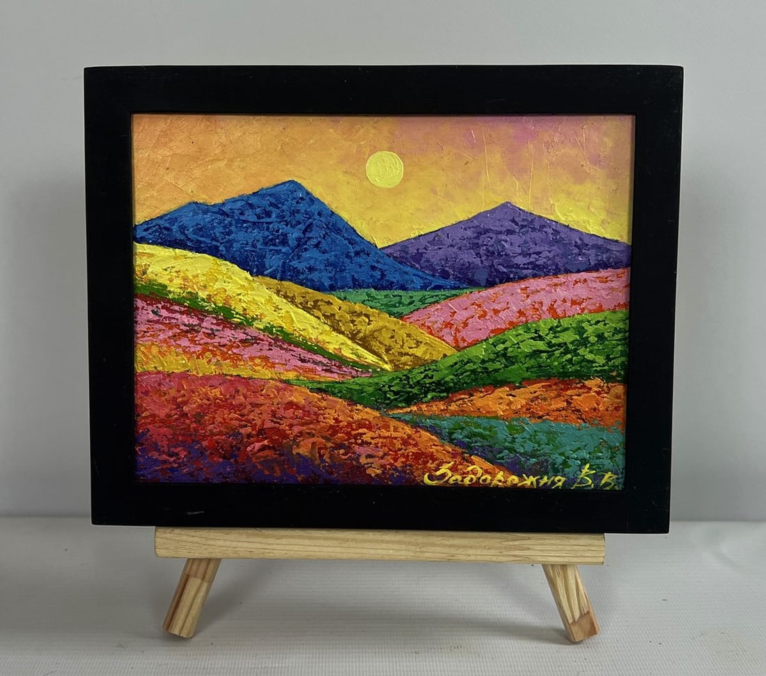 Oil painting The mountains are covered with meadows V. Zadorozhnya: AAA4665 The oil painting on cardboard titled " The Mountains Are Covered with Meadows" presents a breathtaking landscape bursting with vibrant colors and rich textures. The composition is a harmonious