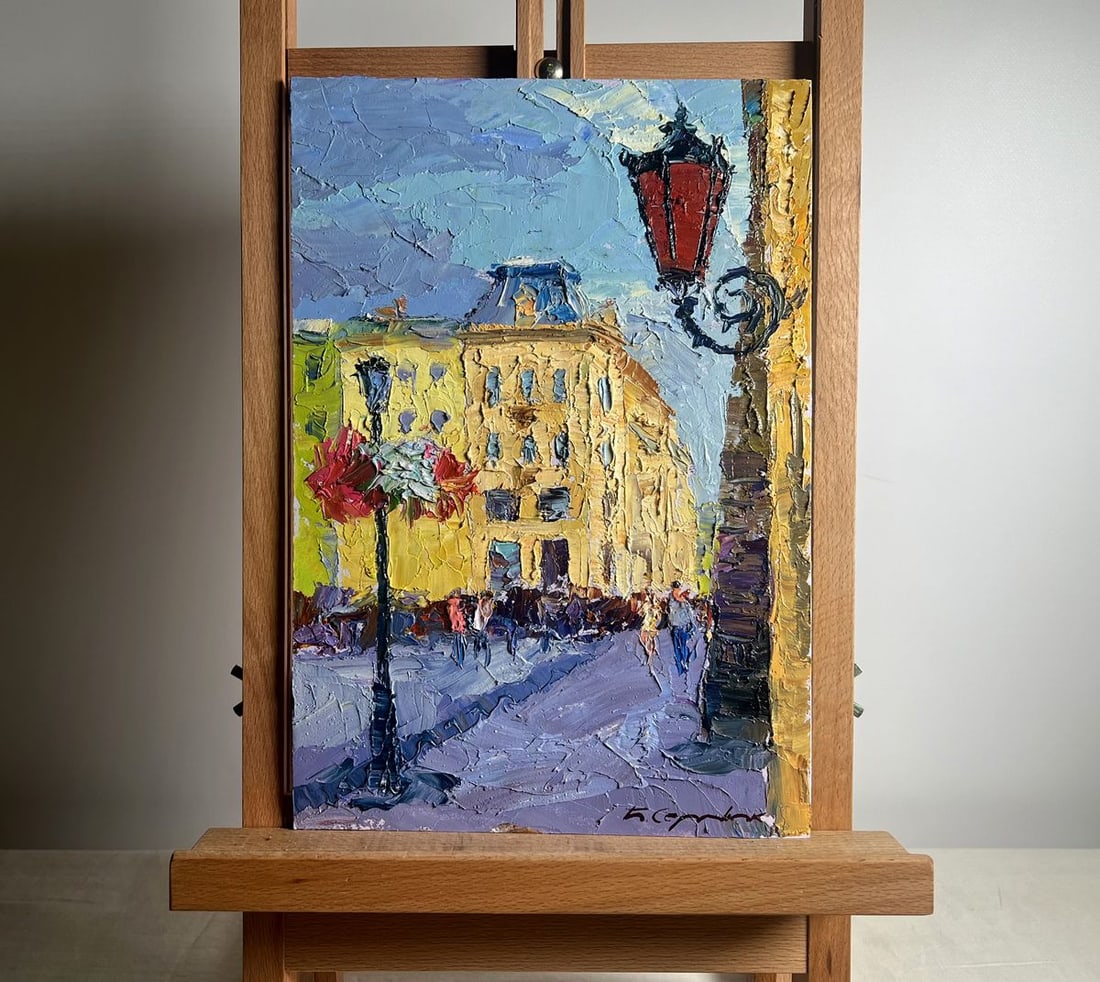Oil painting Summer day in the city Boris Serdyuk: NoAAA3715The painting "Summer Day in the City" is a vibrant and dynamic depiction of an urban scene bathed in warm sunlight. The artist employs thick, expressive brushstrokes in an impasto style,