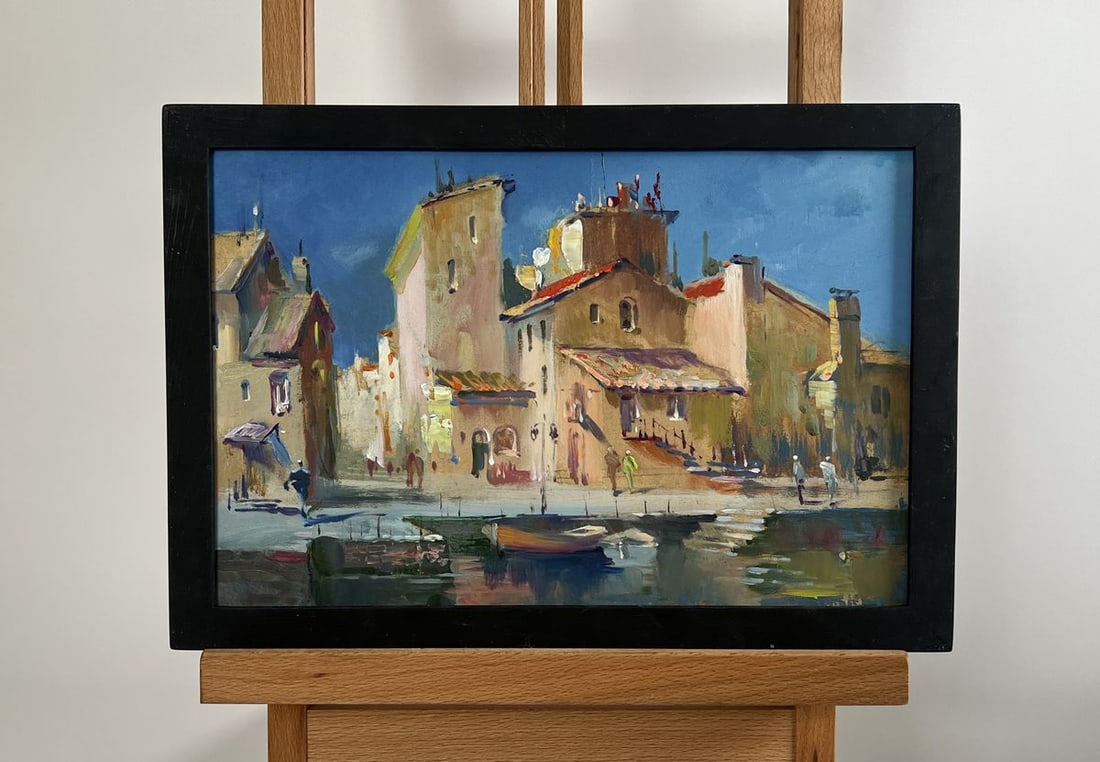 Oil painting Shadows of City Life Yuriy Suprunchuk: NoAAA4274The painting "Shadows of City Life" captures the timeless essence of an old European town bathed in golden light. Rendered in oil on cardboard, this evocative work portrays the interplay of