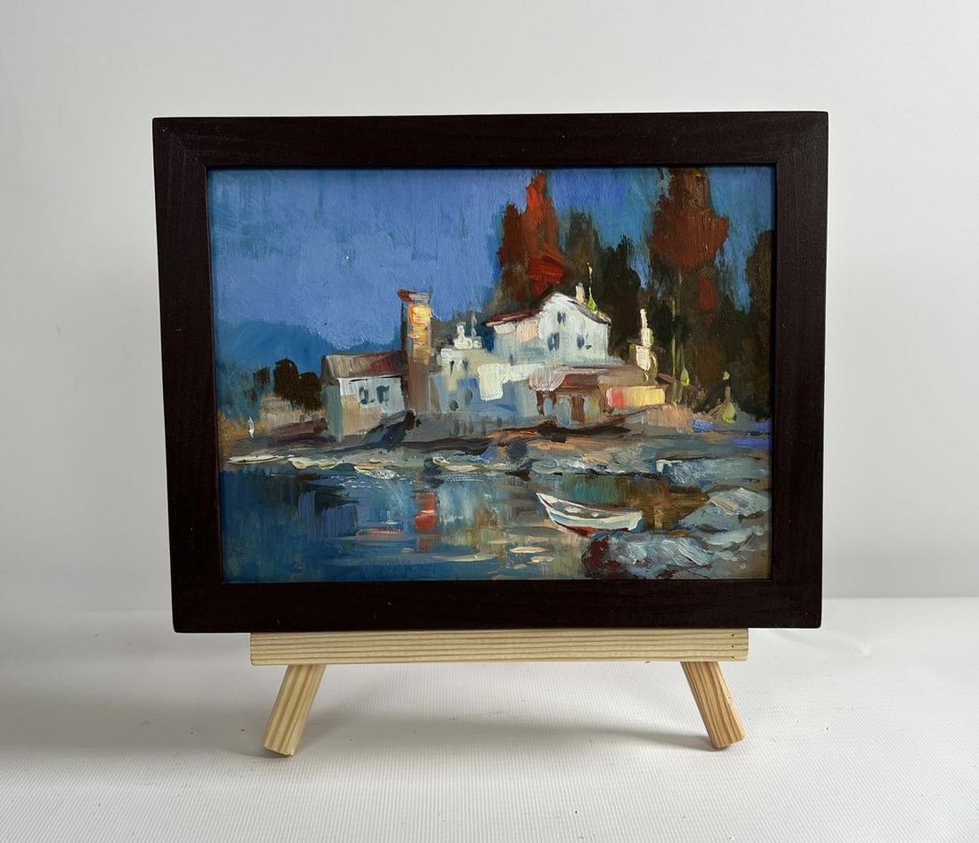 Oil painting Coastal peace Yuriy Suprunchuk: NoAAA4334The painting "Coastal Peace" captures the quiet serenity of a coastal village as twilight sets in. The deep blue sky transitions into a rich, warm glow reflecting the final moments of sunligh