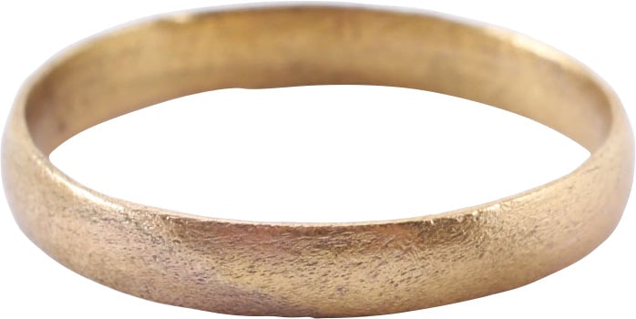 VIKING WEDDING RING, 10th-11th CENTURY AD, SIZE 8 ¼: 10th-11th century AD. Gilt bronze. Size 8 1/4, 3.1mm width, with low rounded face. Superior preservation for these. Vikings exchanged rings on the pommel of the groom’s sword. Professionally