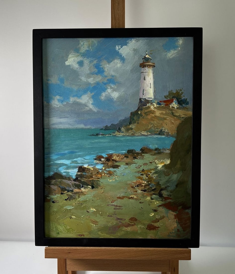 Oil painting Coast with a lighthouse Yuriy Suprunchuk: №AAA5678The Oil painting Cardboard titled “Coast with a lighthouse” captures the serene yet powerful essence of a rugged shoreline where land, sea, and sky converge in a moment of