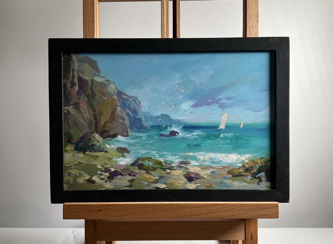 Oil painting Seagulls flying over the sea Yuriy Suprunchuk: №AAA4134The oil painting on cardboard, titled "Seagulls Flying Over the Sea", captures a dynamic coastal scene filled with movement, light, and the vast openness of the ocean. The artist uses ex