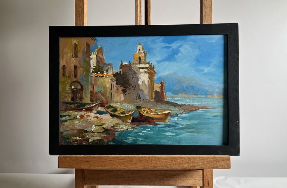 Oil painting City boats by the sea Yuriy Suprunchuk: №AAA4138The oil painting on cardboard, titled "City Boats by the Sea", captures the picturesque charm of a coastal town where history and the sea seamlessly merge. The artist uses a warm and ear