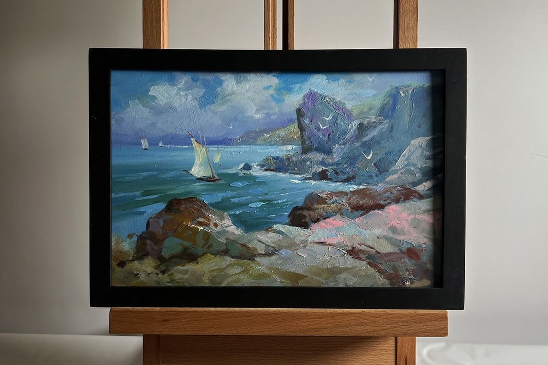 Oil painting Seagulls and rocky shore in the sea Yuriy Suprunchuk: №AAA4141The oil painting on cardboard, titled "Seagulls and Rocky Shore in the Sea", captures the raw beauty of the coastal landscape, where nature reigns in its unbridled majesty. The artist