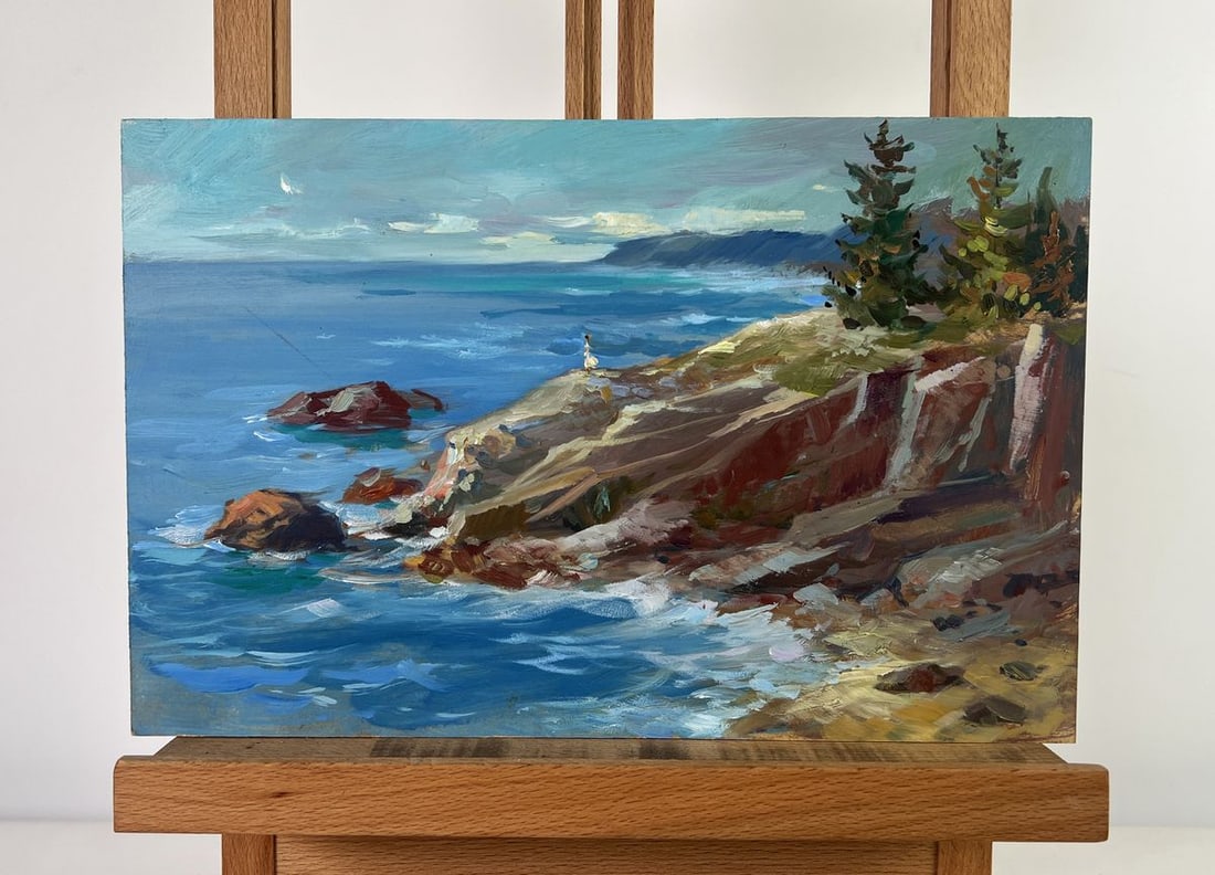 Oil painting Between the sky and the sea Yuriy Suprunchuk: №AAA4140The oil painting on Cardboard titled "Between the Sky and the Sea" captures a breathtaking moment of solitude and natural majesty along a rugged coastline. This small-format plein air