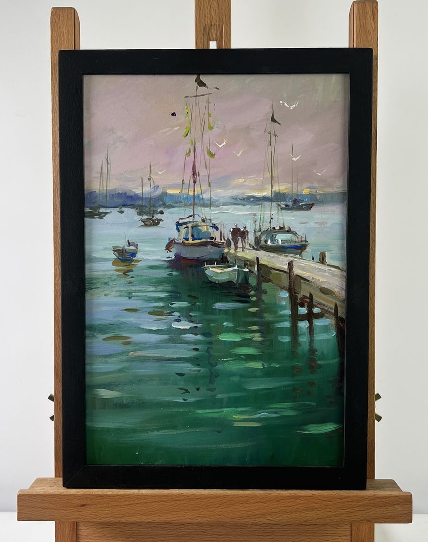 Oil painting Where boats sleep at the pier Yuriy Suprunchuk: №AAA5183The oil painting on Cardboard titled "Where Boats Sleep at the Pier" offers a tranquil and meditative glimpse into a seaside harbor at rest, where time seems to slow and the whisper of