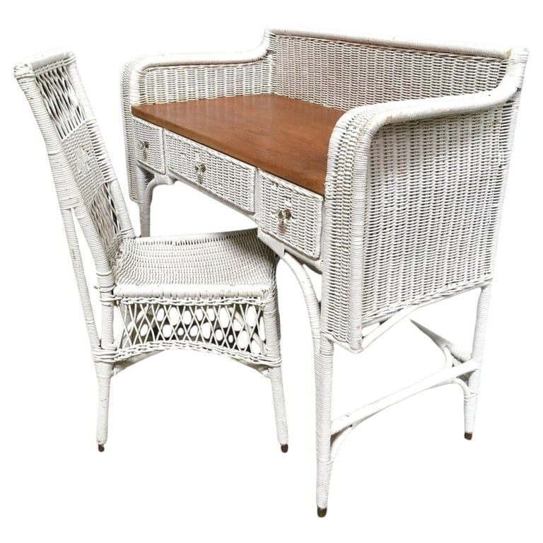 Shabby Chic White Wicker Mahogany Top Writing Secretary Desk w/ Chair: Mid-century white wicker writing desk with Mahogany wood desktop and matching chair. The desk features three woven drawers with decorative glass pulls and has a gracefully curved arms and arched