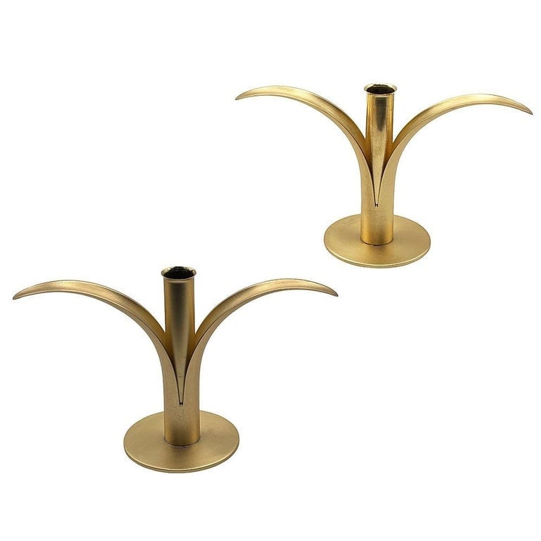 MCM "Lily" Candlestick Holders w/ Brass Inserts By Ivar Ã…lenius BjÃ¶rk for Ystad: This set of two Classic, Mid-Century "Lily" candle holders including the rare inserts designed by Ivar Alenius Bjork for Ystad Metal in Sweden. Crafted from solid brass with matching removable brass