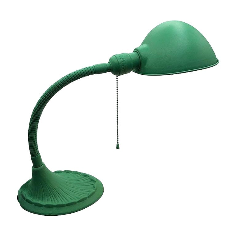 Art Deco Gooseneck Desk Lamp w/Dome Shade and Shell Base: Art Deco desk lamp featuring a large hemispherical shade mounted on a flexible gooseneck arm above a decorative shell-form base. The design combines the functional efficiency of industrial task