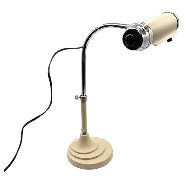 Streamline Modern Chrome and Enameled Bankers Desk Lamp by Radionic: Streamline Art Deco styled chrome and enameled Bankers Desk Lamp by Radionic Trans Co. The lamp features Enameled steel shade with polished chrome-plated end caps mounted on graceful curved chrome sup