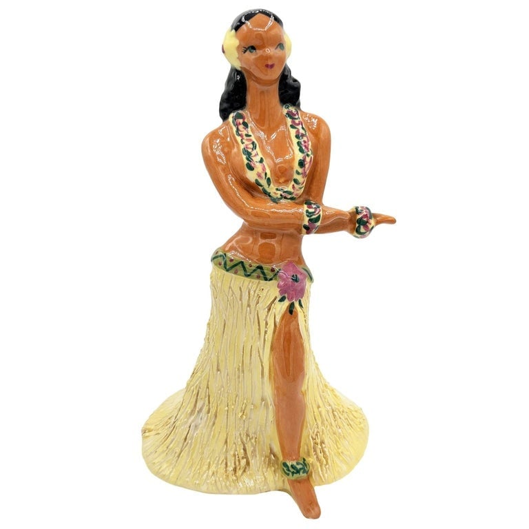 Rare Mid-Century Hawaiian Dancing Hula Ceramic Girl Vase Signed by Yona Lippin: This elegant ceramic figurine by artist Yona Lippin is a prime example of mid-century California Pottery. The hula dancer is captured in a graceful pose, wearing a textured yellow "grass" skirt with