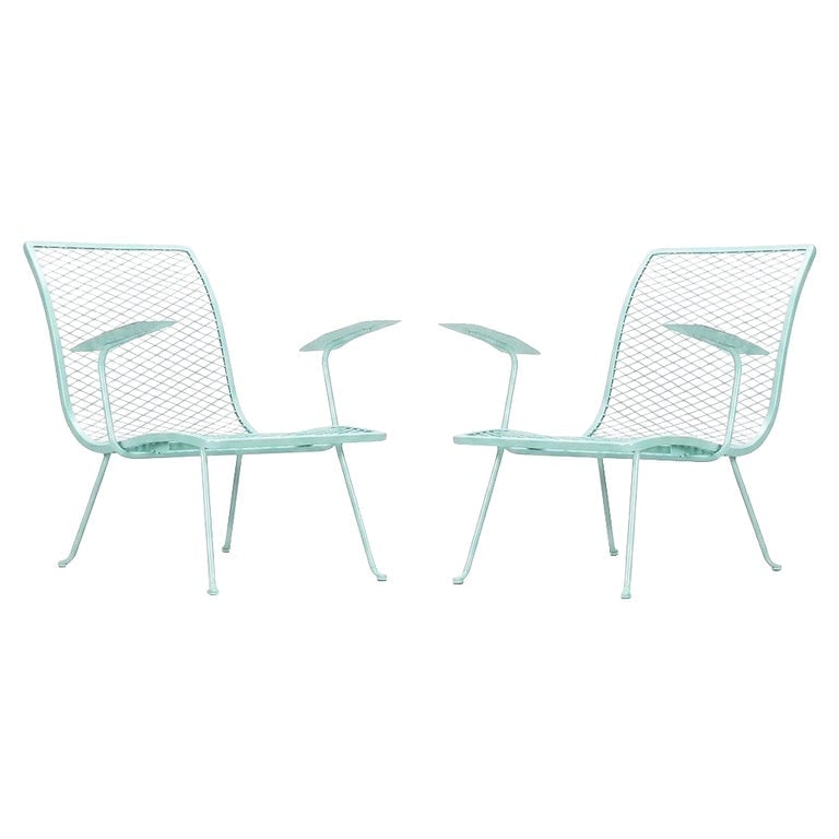 Pair of Teal Outdoor Patio Lounge Chairs by Karl Lightfoot Studio: Pair of Karl Lightfoot Studio outdoor lounge chairs crafted from tubular steel and expanded metal mesh, finished in a vibrant teal powder coat. Showcasing the clean lines and sculptural simplicity tha