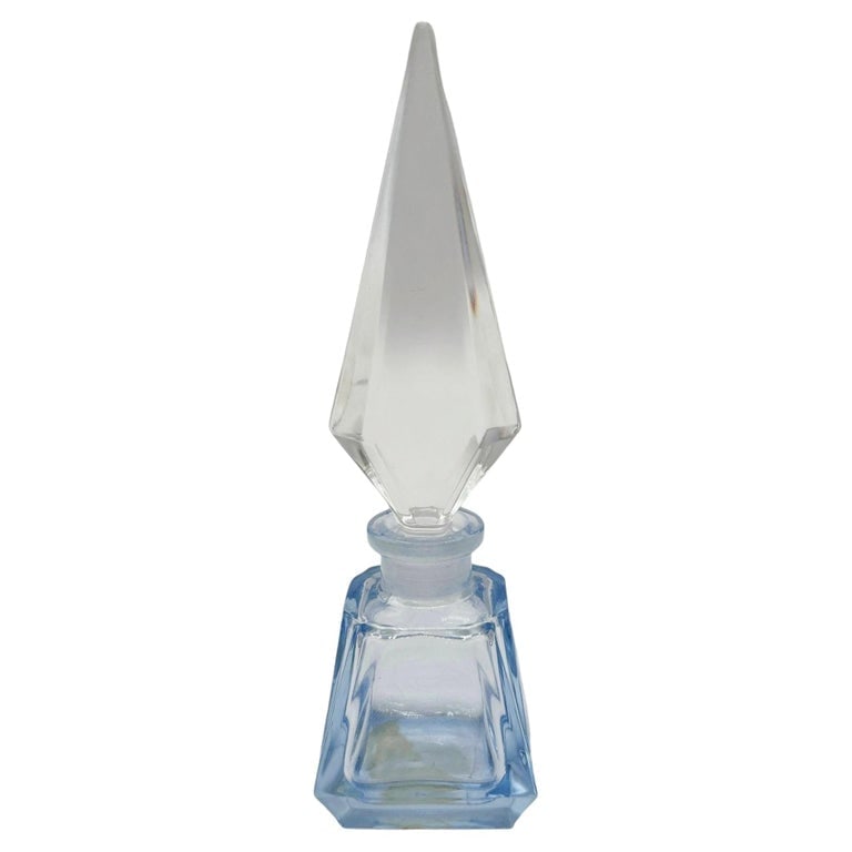 Art Deco Geometric Blue Crystal Perfume Bottle by Irice West Germany: This elegant ultra modern mid-century crystal perfume bottle by Irice in West Germany showcases the striking geometric design with the popular European glass-work style of the middle 20th century . Cr