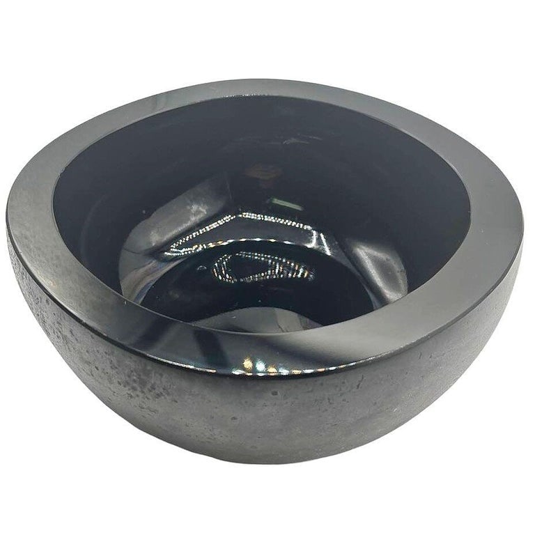 Mid-century Italian Murano Black Art Glass Bowl Signed Boudin Murano: This exquisite Murano art glass bowl signed Boudin Murano. Shaped as a rounded square, it features a stunning contrast between its textured, stone-like exteriorreminiscent of natural pumiceand the