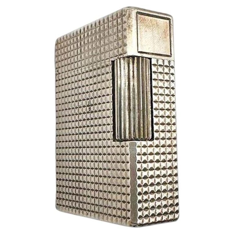 French Modern Silver and Gold Plate Gas Pocket Guilloch Lighter by S.T. Dupont: Crafted in silver and gold plate butane lighter with an elegant tiny stud-like textured motif guilloch / hobnail pattern, this piece reflects the impeccable craftsmanship and understated luxury for wh