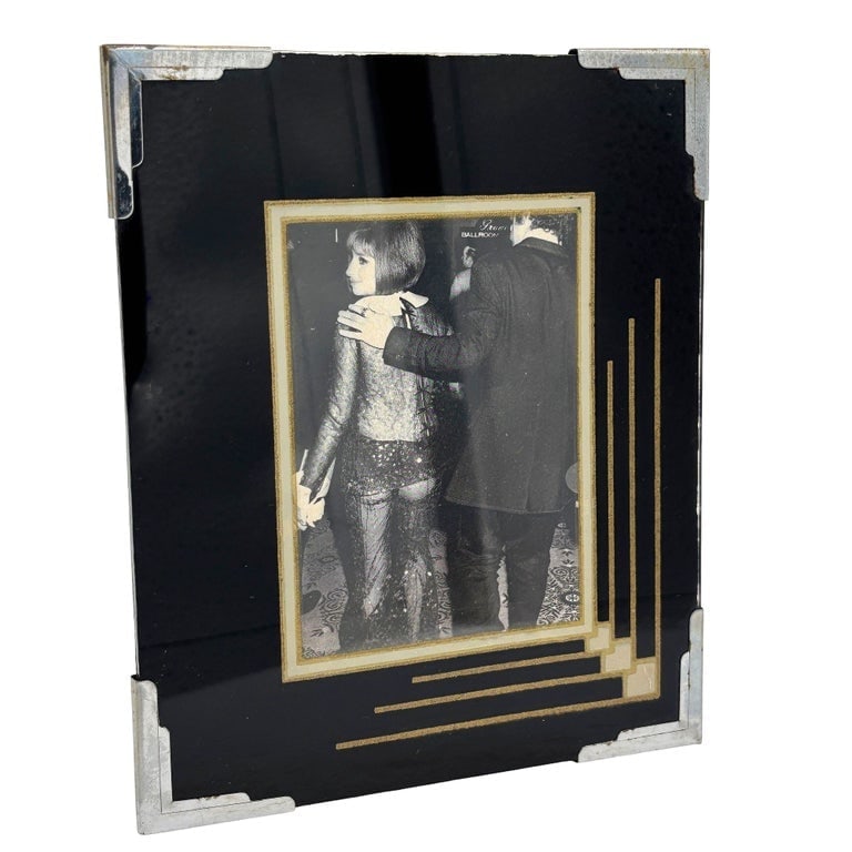 1920s Art Deco Reverse Black and Gold Painted Glass Picture Frame 5x6: 1920s Art Deco Reverse Black and Gold Painted Glass Picture Frame currently holding a print of Barbra Streisand's Iconic 1968 Oscar Outfit Holds a 4 x 3 picture, overall size is 6" x 5" * Small scratc