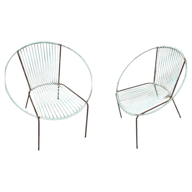 Mid-Century Iron and Rubber Cord Loop Outdoor/Patio Chair by Salterini, Pair: Original pair of Mid-century modern iron hoop chairs by Salterni, a classic outdoor furniture design from the 1950s. These chairs feature a circular Iron frame with an open-weave seat and back made