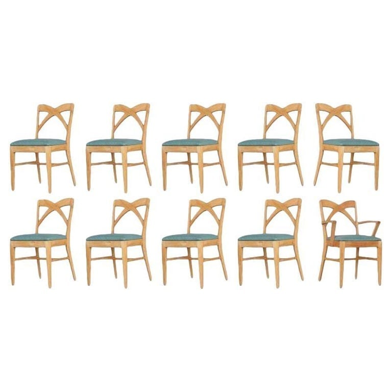 Mid-century Blond Birch Dining Chair by Paul Frankl for Brown Saltman, Set of 10: Set of 10 blond birch dining chairs by Paul Frankl for the Brown Saltman group. The chairs are upholstered in high quality blue cotton fabric with a unique crisscross "X" chair back. Great example of 