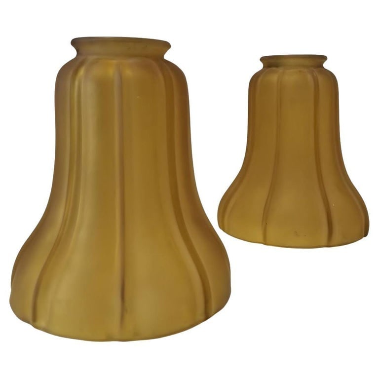 2" Amber Frosted Fluted Art Nouvea Style Bell Shade, Pair: A pair of 2-inch amber frosted fluted bell Art Nouveau bell shades embodies vintage elegance with their amber-tinted, frosted glass and fluted design. Shaped like bells, these globes diffuse light sof