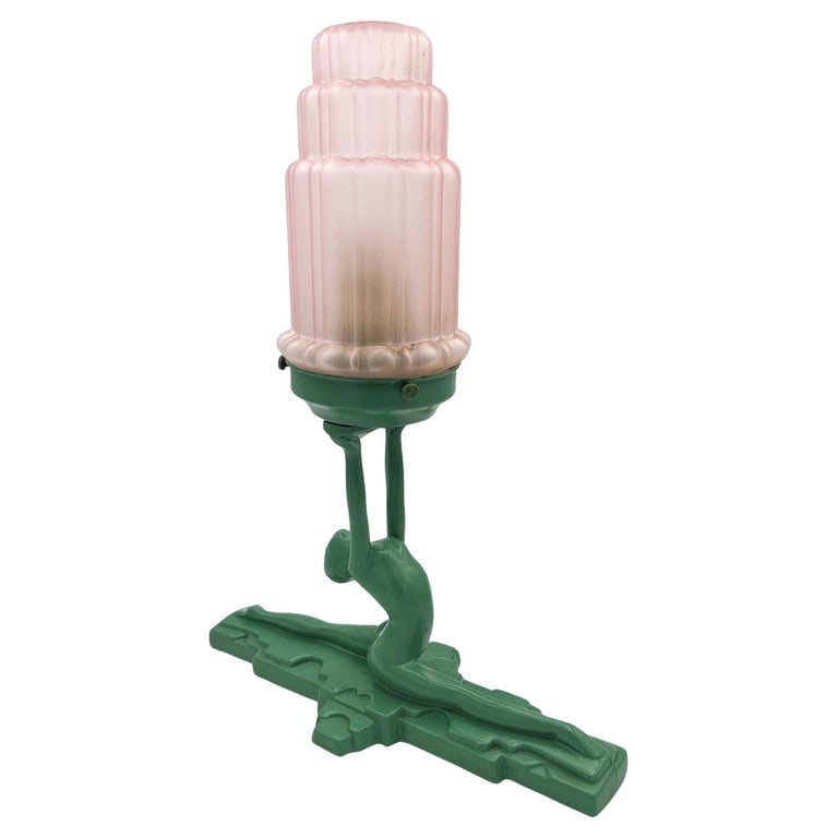 Art Deco Figure Nymph L610 Spelter Frankart Table Lamp by Sarsaparilla w/ Shade: This Frankart sculptural table lamp features a beautiful Figure woman doing a split on a stepped base, holding a 3" lamp shade. The whole sculpture comes together to create a simple yet elegant Art De