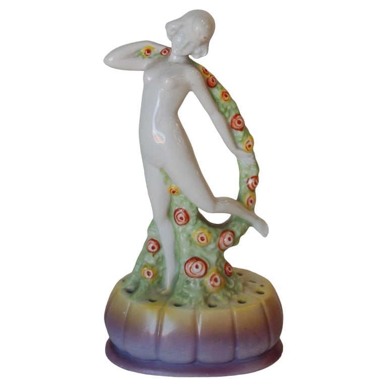 Art Deco Porcelain Female Figurine Made in Germany Numbered: Art Deco Porcelain Floral Dancing Female Figurine Made In Germany. Numbered 3944. Measures 7.5" High x 4" Wide x 2.5" D Reserve: $57.00 Shipping: Domestic: Shipping rates are determined by