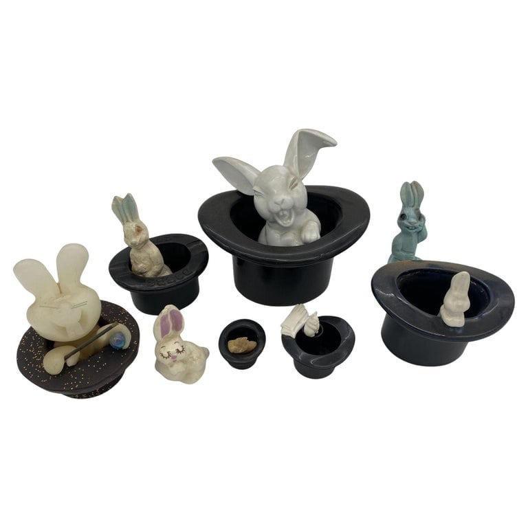 Magician Black Bunny in a Hat Rabbit Figural Collection: Magician Black Bunny in a Hat Rabbit Figural Collection featuring 4 Ceramic statues, 2 Ceramic tophats, 1 Ceramic tophat ashtray, 1 Ceramic tophat with a bunny on the side, 1 magic tophat with pop-up 