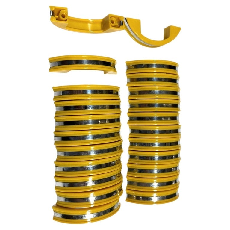Yellow Phonic Resin Drawer/Door Pull with Aluminum Accent, Set of 23: Post-war early yellow phonic resin based plastic pull used for drawers and cabinet doors with a polished aluminum center band in the middle of the handle. There is a total set of 23 in never used