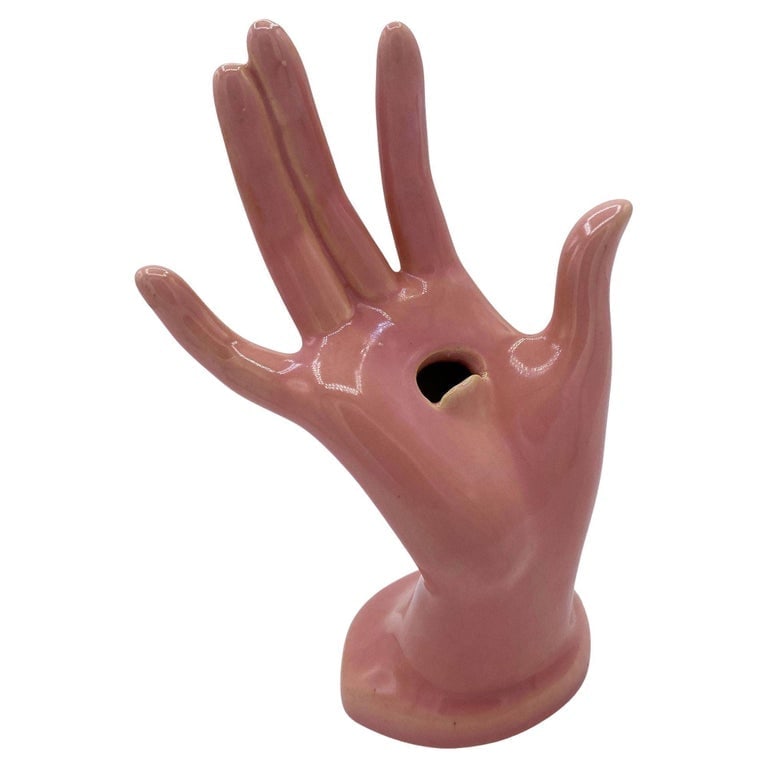 California Pottery Salmon Pink Figurative Female Hand Business Card Holder: California Pottery salmon pink figurative female hand business card holder. The sculpture features an open hand with a small lip in the center palm for holding business cards. The handcrafted figurine